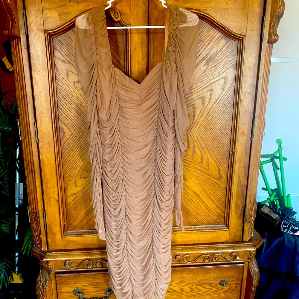 Beige new dress. Makes your body look amazing. Zipper in the back